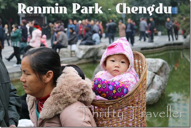 Child in a basket at Renmin Park, Chengdu