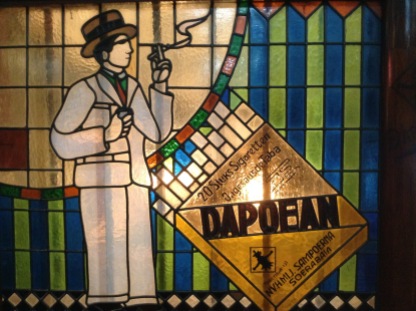 Nice art-deco stained-glass windows advertising Sampoerna products.